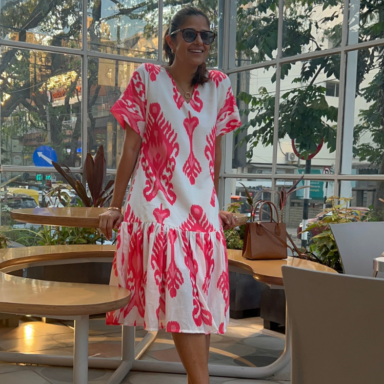 Large frill hem detail on Jolene ikat print summer shift dress