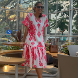 Large frill hem detail on Jolene ikat print summer shift dress