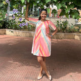 Peach striped dress by Poppy & Co featuring a soft fabric, classic stripe pattern, and a comfortable, stylish fit.