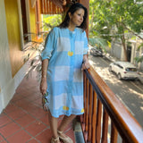 Blue shirt dress by Poppy & Co featuring button-down front, lightweight fabric, and a relaxed, casual fit.
